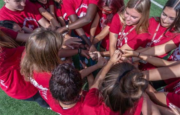 students in huddle